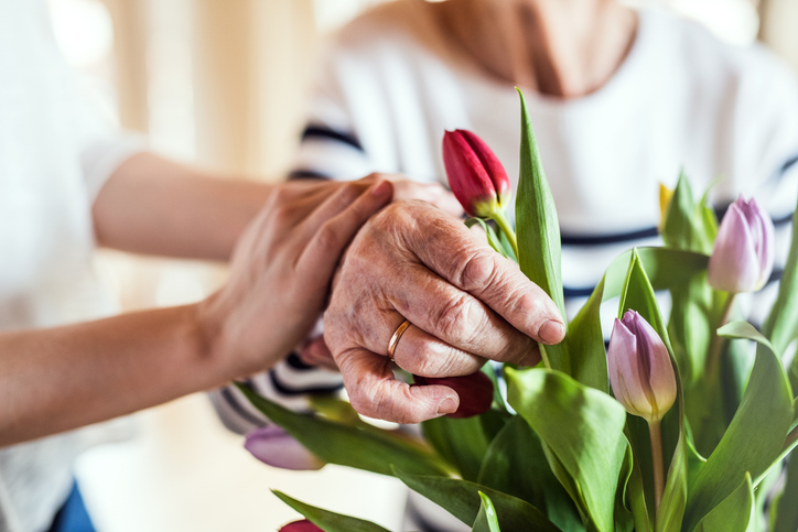 hands working on flowers
